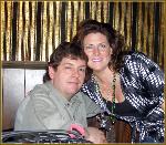 Chuck takes a break from the dobro and poses with Holly for a pesky photographer.